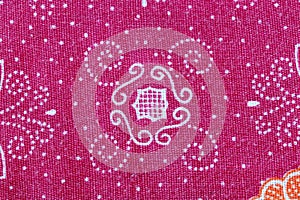 Thai Batik sarong of red flower pattern.