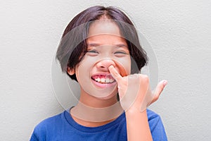 Thai Child Picking Nose