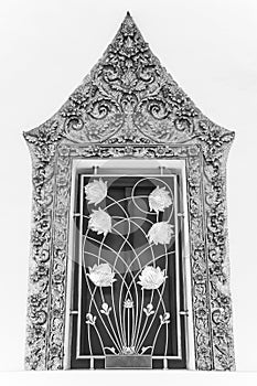 Thai classical style ancient art of window frame in temple