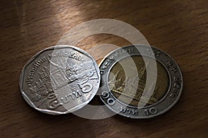 Thai coin close-up view on wooden ground,thai money,spot focus