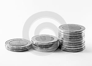 Thai coins arranged on a white background