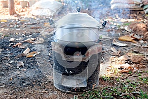 Thai cooking style, steam pot on vintage local fire-stove