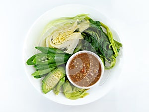 Thai cuisine nam prik or chili paste with various vegetables or with blanched vegetables, Thai Traditional Local Food on white