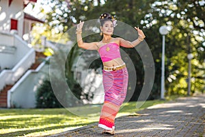 Thai dancing girl with northern style dress in temple