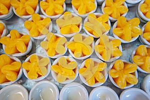Thai desserts Khanom Thai, Sweet Egg Yolk Cup or Tong Yip, the photo