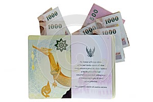 Thai electronic passport with folded Baht Banknotes