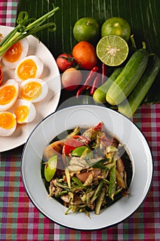 [Thai Esan food] Papaya Salad with boiled egg, Thai Esan local food, Thailand