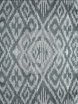 Thai fabric pattern as background.