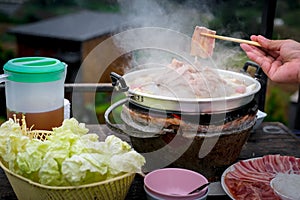 Thai famous food pork grill called moo kra ta