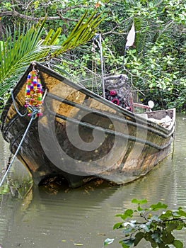 Thai fishing boat on the jungle river