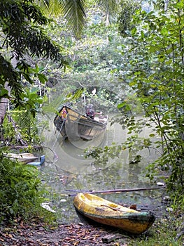 Thai fishing boat on the jungle river