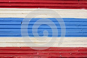 Thai flag painted on corrugated metal wall