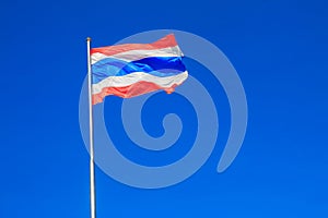 Thai flag of Thailand with blue sky background