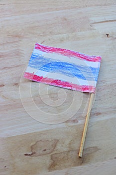 Thai flag on wooden background