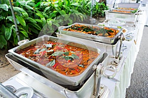 Thai food buffet on silver tray
