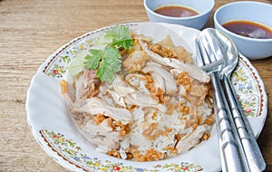 thai food gourmet fried chicken with rice, khao man kai tod crispy pork in wood background.