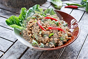 Thai food Ground pork salad or Spicy minced pork salad