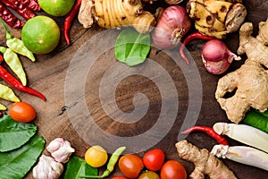 Thai food ingredients, spices and herbs on wooden background