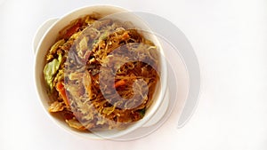 Thai food,Japchae glass noodles stir fried with Egg and Vegetable on white background.