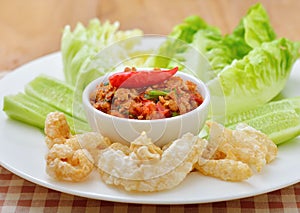 Thai food ,Nam Pik Aoung , chili sauce on white plate