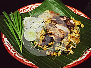 Thai food Pad thai is fried with grilled chicken Thailand style original banana leaf bottom groove delicious must try Menu in