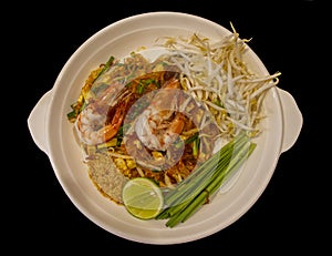 Thai food, Pad Thai, dry noodles, street food, the most delicious, food photography on black back, top view