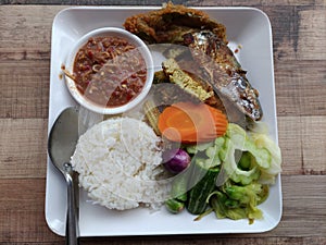 Thai food rice and chrimp paste sauce and vegetable photo