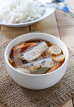 Thai food spicy mackerels fish ,Tom yum canned mackerels in tomato sauce on sackcloth pat