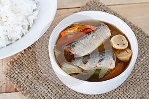 Thai food spicy mackerels fish ,Tom yum canned mackerels in tomato sauce on sackcloth pat