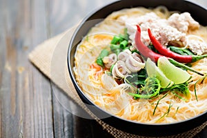 Thai food, Spicy rice noodles soup with spices and herbs Tom Yum soup