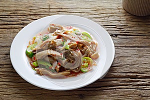 Thai food,Spicy salad boiled pig stomach with cucumber and Shallot mixed with spicy sauce