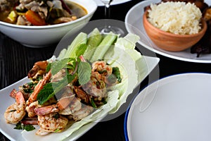 Thai food - spicy Shrimp salad with garlic and basil