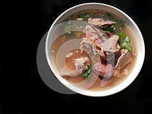 Thai food style, Top view of clear soup with congealed pork blood