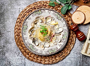 Thai food White Sauce Clams in a dish top view on grey background Taiwan street food