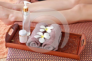 Thai foot massage alternative medicine therapy with Thai herb aroma oil , background for spa and alternative medical therapy