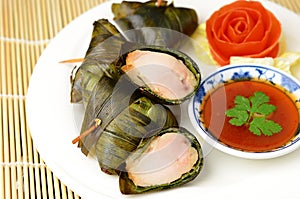 Thai fried chicken in pandanus leaves