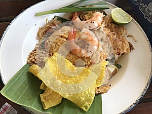 Thai Fried Noodles `Pad Thai` with shrimp and vegetables