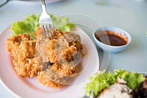 Thai fried shrimp cake on pink plate