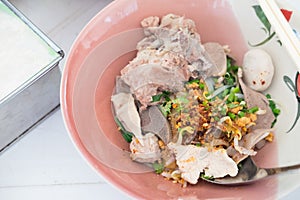 Thai Fusion Food, dry noodle with pork in ceramic bowl