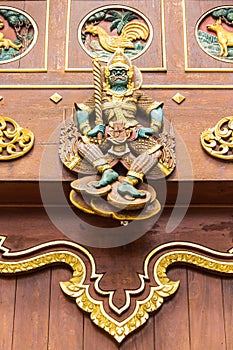 Thai giant Wood Carving on teak chapel