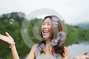 Thai girl enjoy with air bubbles
