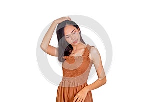 Thai girl long hair in brown tank top dress touch her hair