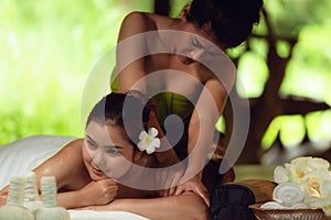 Thai girls therapist body spa massge and lying relaxation in business massaging and salon shop., Pretty attractive asian woman is