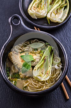 Thai green curry chicken soup with pak choi