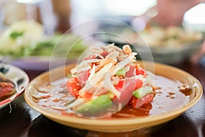 Thai green papaya salad, which is also known as Som Tam is one of the most commonly available and most popularly consumed dishes