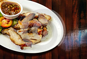 Thai Grilled Pork Neck or Kor Moo Yang Street food, popular menu of tourists