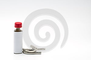 Thai herbal powder snuff in classic bottle with red cap and two snuff tube made of steel and chrome