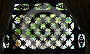 Thai house window, garden view