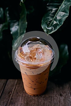 Thai Iced tea, Thai tea milk on wooden table