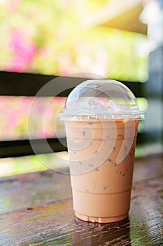 Thai Iced tea, Thai tea milk on wooden table